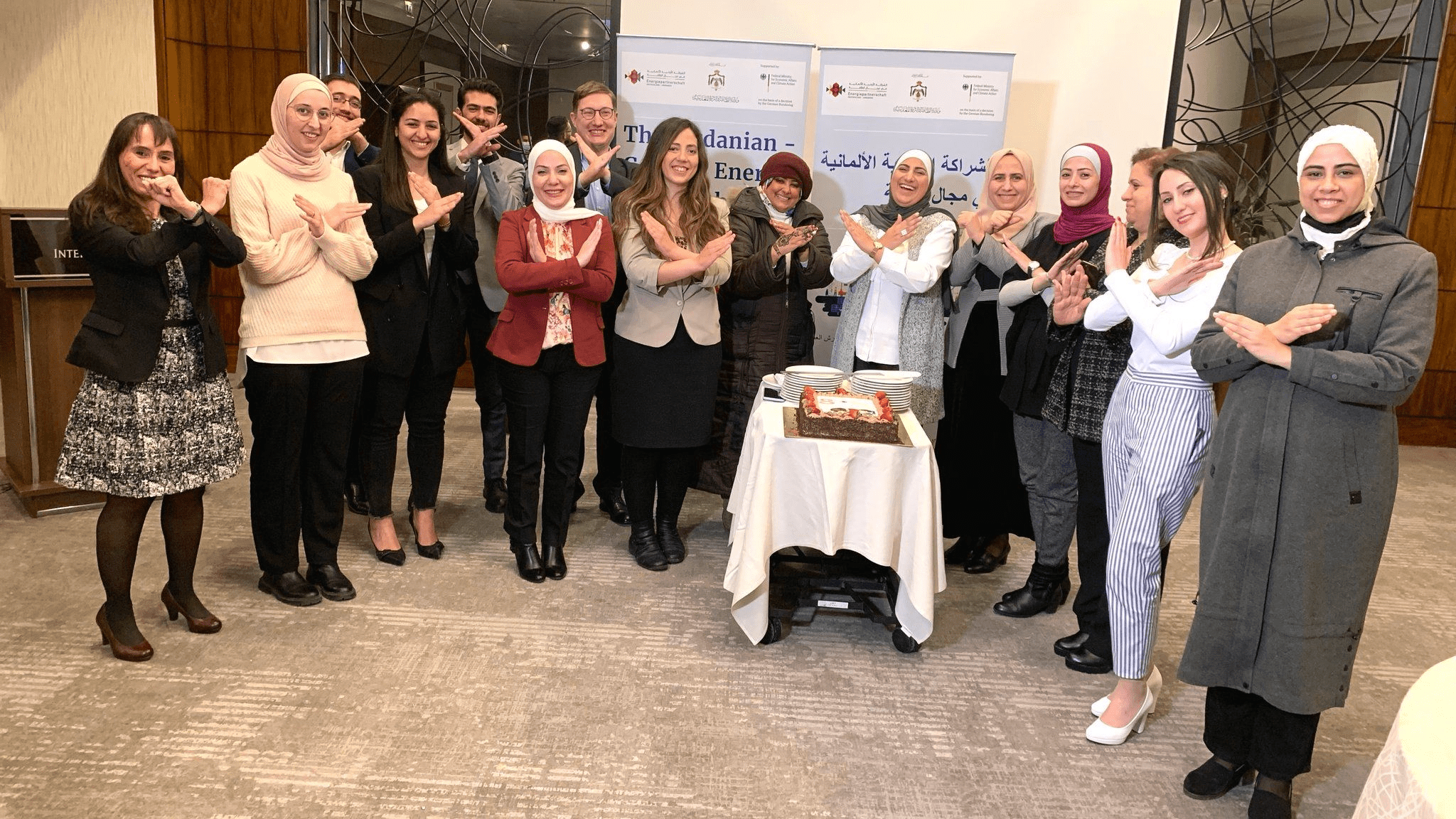 Group photo of Jordanian women showing the breaking the bias hand sign